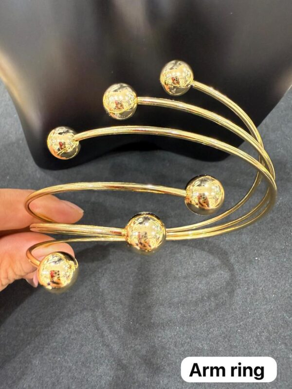 Gold ball arm cuff
